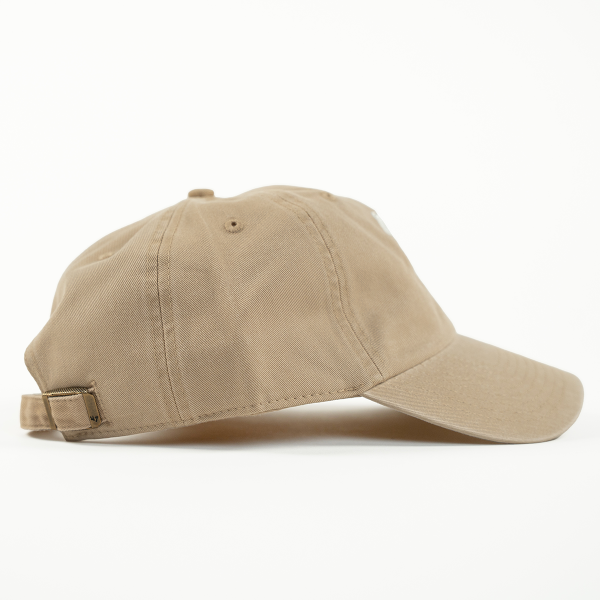 Beige baseball cap on a white background
