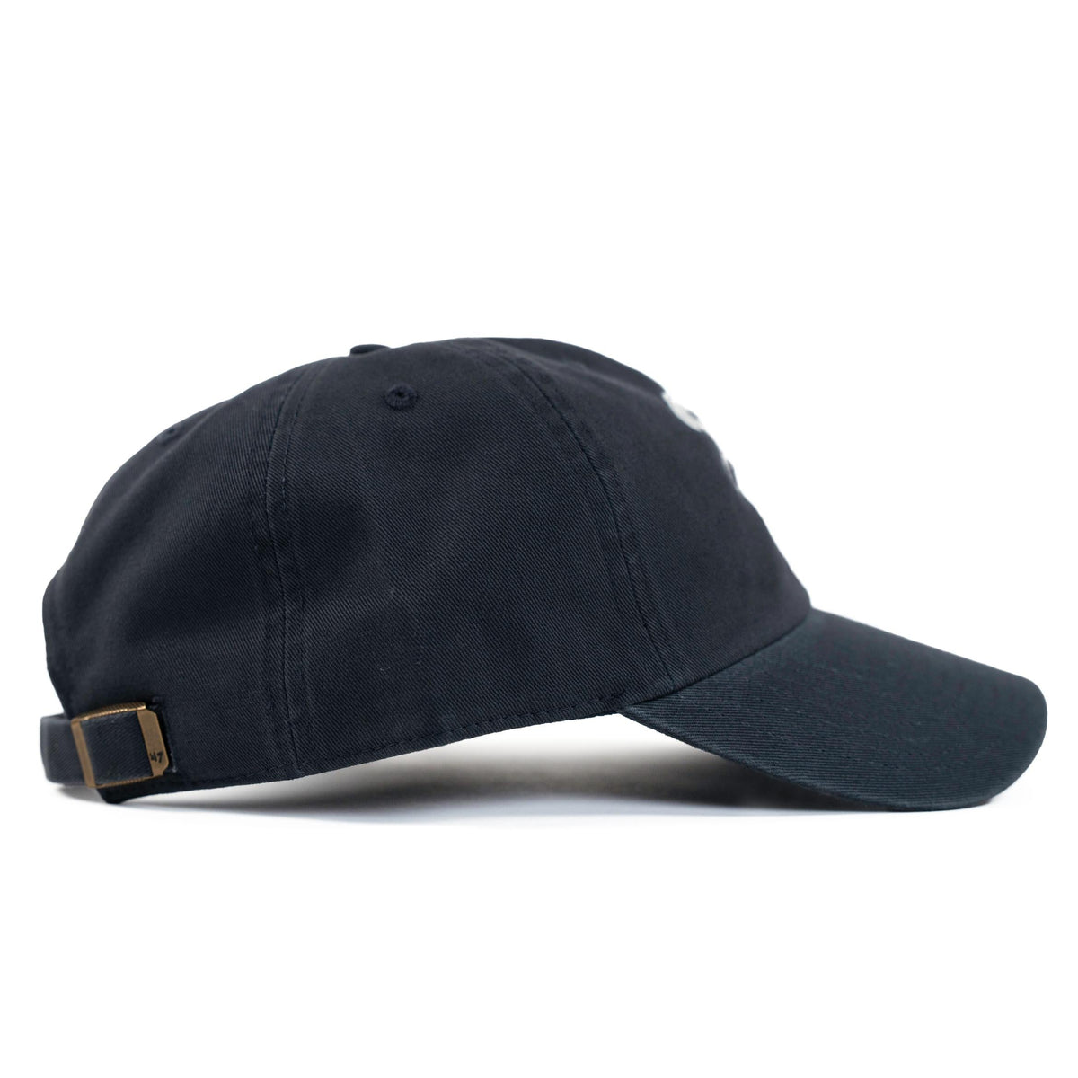 Side view of a vintage navy 47 dad hat with an adjustable metal buckle strap